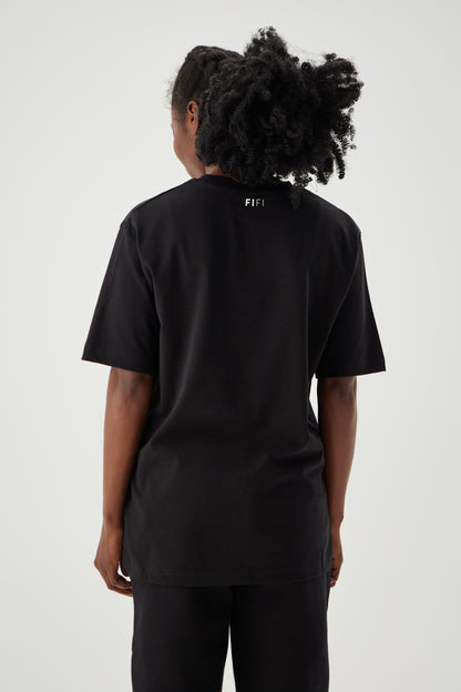 Women wearing regular black t-shirt back view